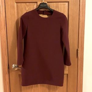 Moon open-back mini dress.